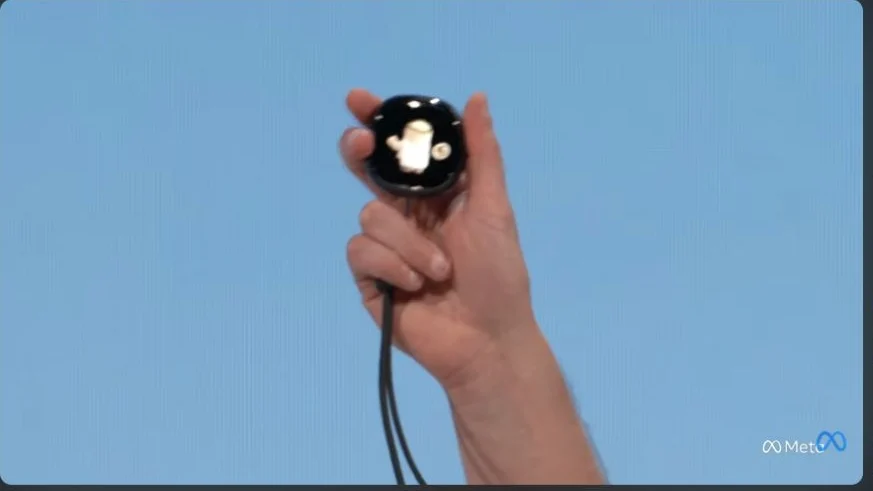 Meta Connect 2026: Every Product Announced, Specs, Prices, and Release Dates 10 Muse Charm pocket device held on stage during the Meta Connect 2026 keynote