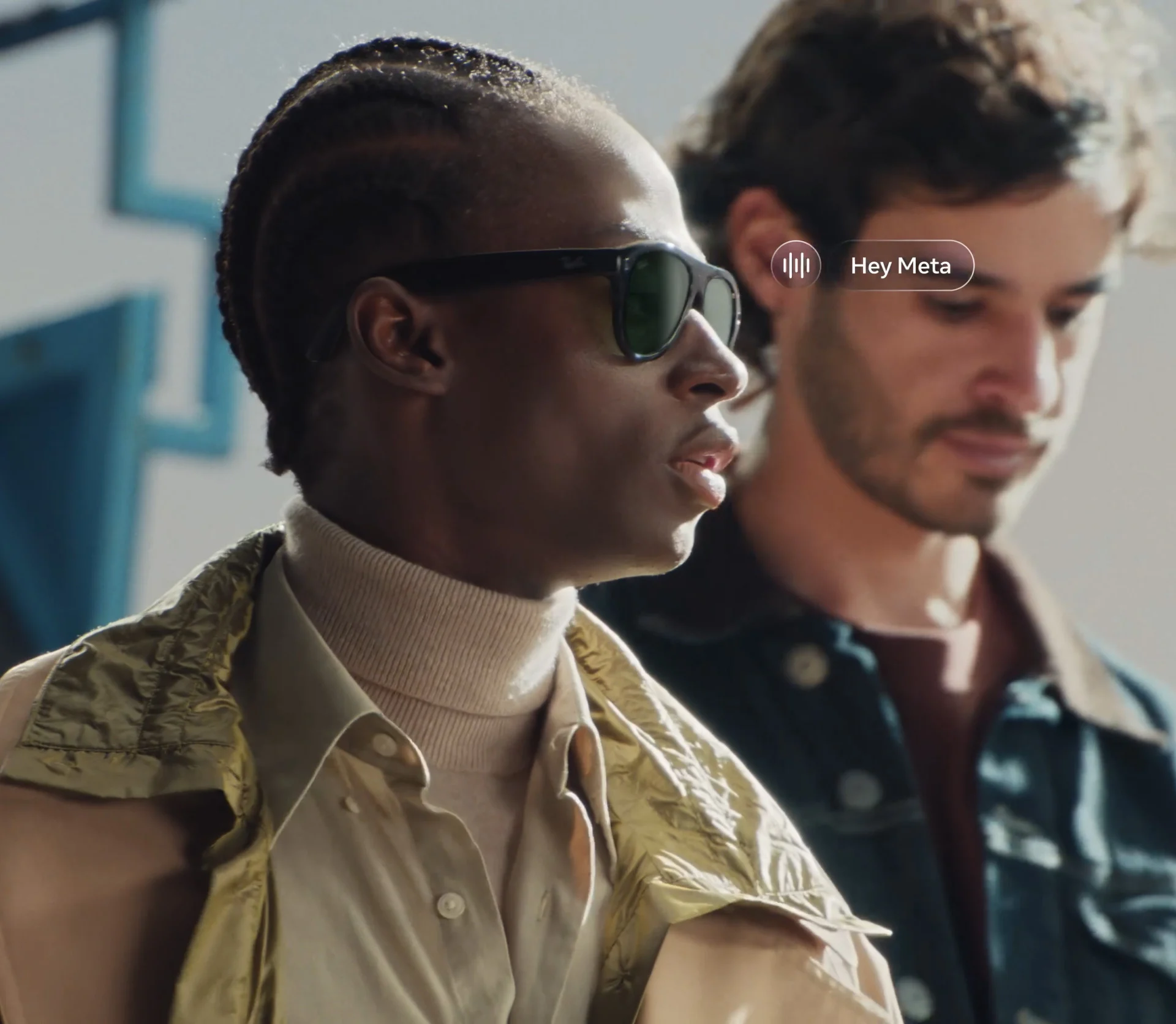 A person wearing Ray-Ban Meta Gen 3 glasses and activating Meta AI