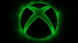 A glowing green Xbox logo on a black background.
