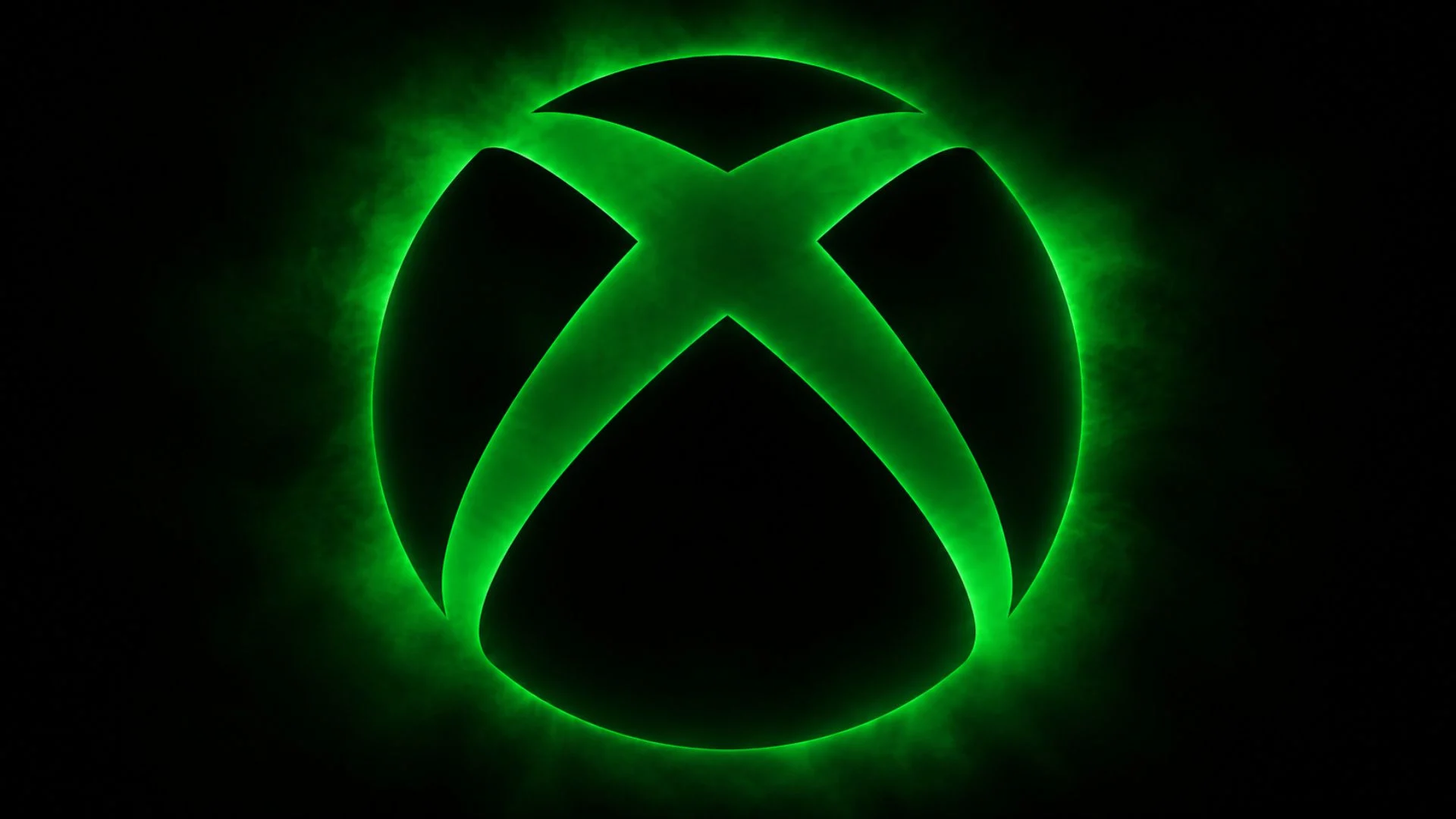 Microsoft Reportedly Plans À La Carte Xbox Game Pass Overhaul 1 A glowing green Xbox logo on a black background.