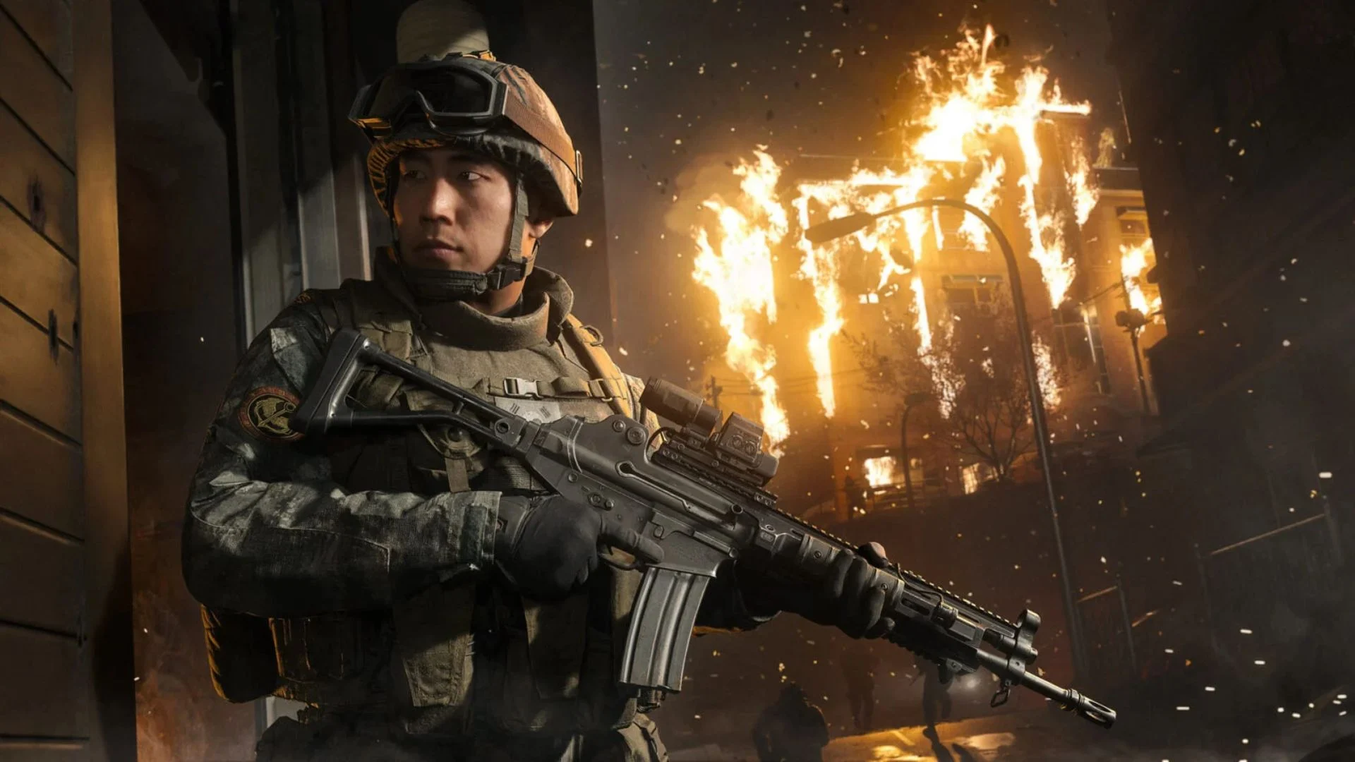 Armed soldier in Call of Duty: Modern Warfare 4 with a burning building behind him